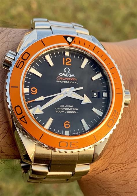 planet ocean orange bezel